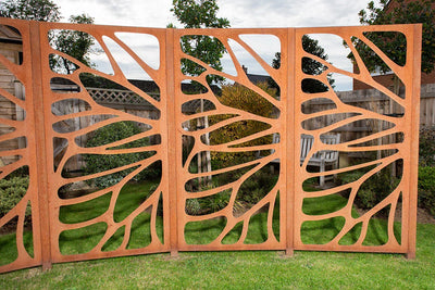 Choosing Garden Wind Protection: A UK Guide to Metal Panels and Hedges